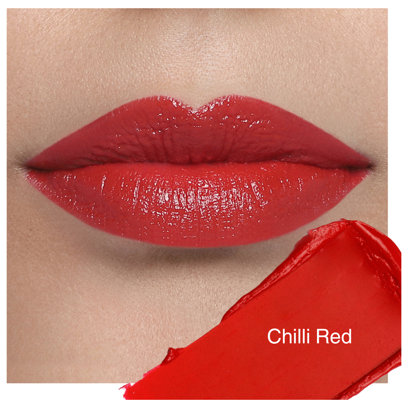 Luscious Cosmetics Hydracolor lipstick in a bright red shade with the cap off, showcasing its creamy, satin-matte texture.