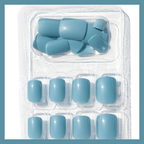 Luscious Cosmetics Blue Moon short press-on nails in a solid glossy blue finish.