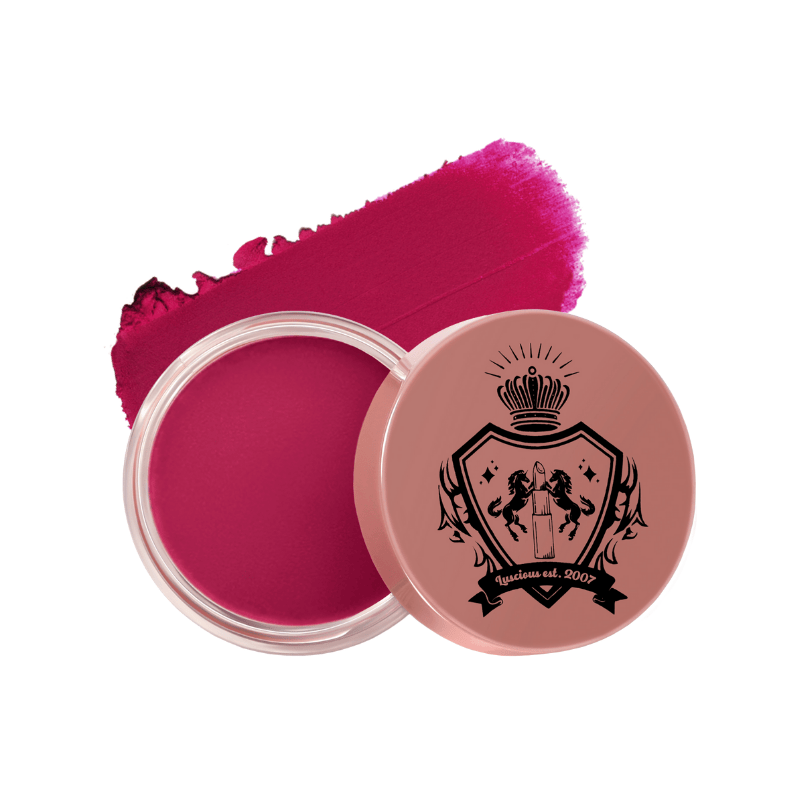 Pink cream blush in a round container with a decorative lid by Luscious Cosmetics on a white background.