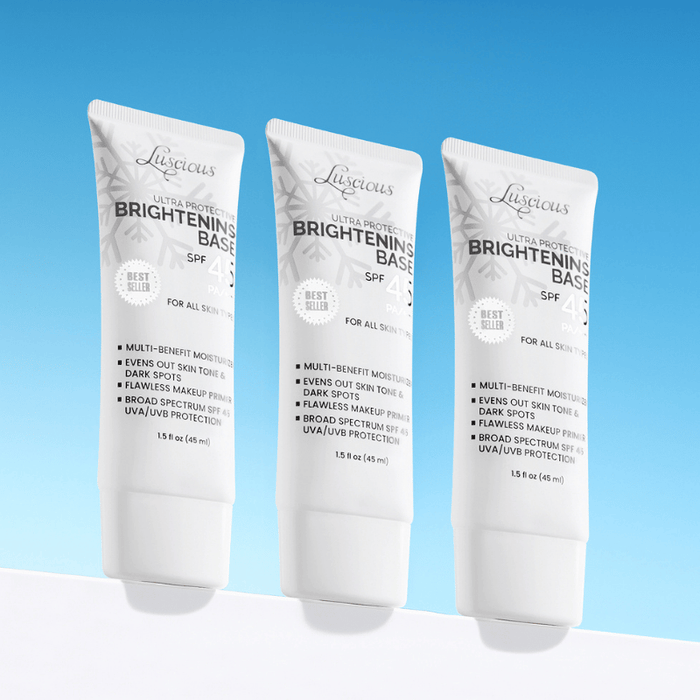 Luscious Cosmetics Brightening Base SPF 45 glow primer and sunscreen tube.