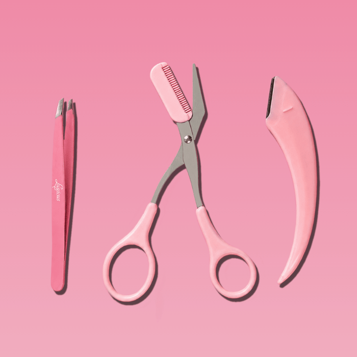 Luscious Cosmetics Brow Grooming Set with tweezers, brow scissors, and folding razor.