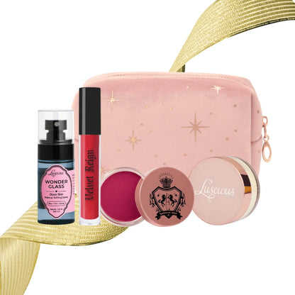 Luscious Cosmetics Deluxe Makeup Kit Red featuring perfume, lip gloss, lip balm, and makeup pouch on a white background.