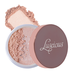 Jar of Luscious Cosmetics highlighter powder with the lid off, revealing a shimmery light pink luminizer.