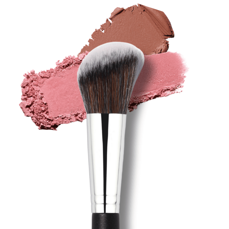 Luscious Cosmetics angled contour brush with wooden handle and synthetic bristles, shown with pink and brown makeup swatches on a neutral background.