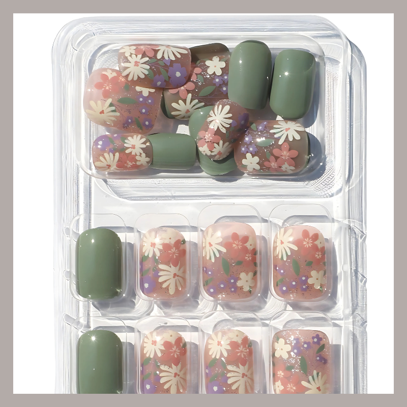 Luscious Cosmetics Spring Bloom short press-on nails featuring floral nail art design.