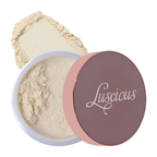 Jar of Luscious Cosmetics highlighter powder with the lid off, revealing a shimmery light pink luminizer.